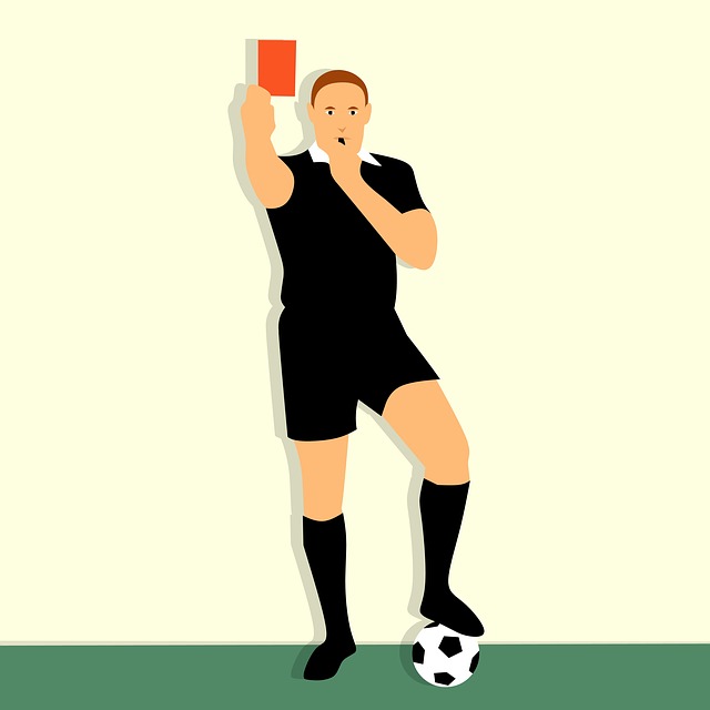 Football referee with red card