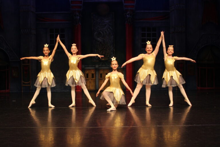 Polly Allen (middle) on stage in Cinderella in Hollywood as part of the English Youth Ballet