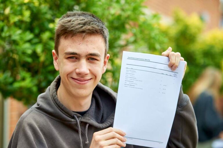 Alex with his A level results