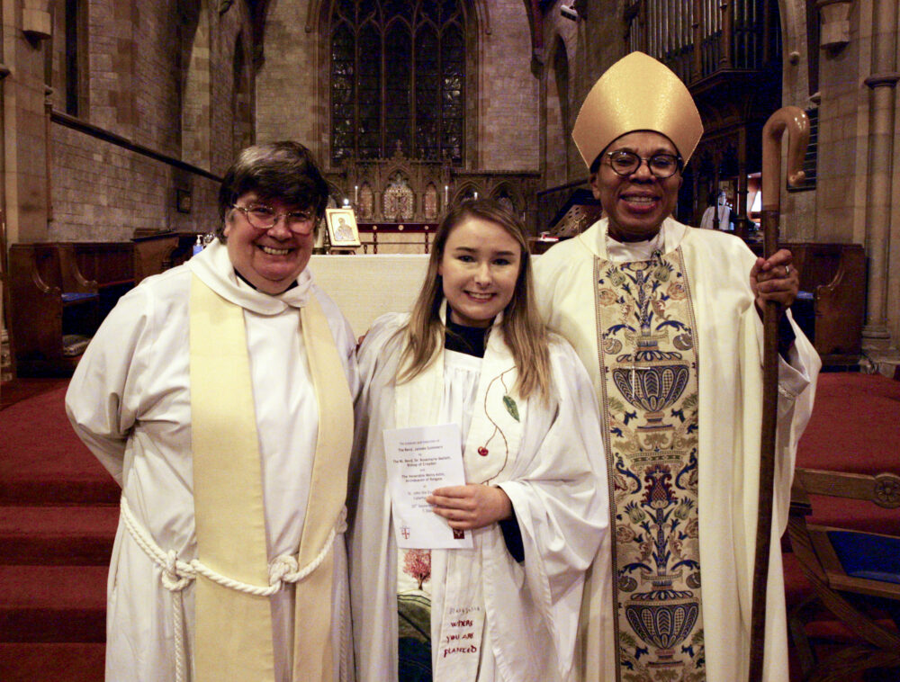 The Rev Jaimee Summers (centre, at their Collation and Induction service on 25 September), the Rt Revd Dr Rosemarie Mallett, Bishop of Croydon (R) and The Venerable Moira Astin, Archdeacon of Reigate (L)