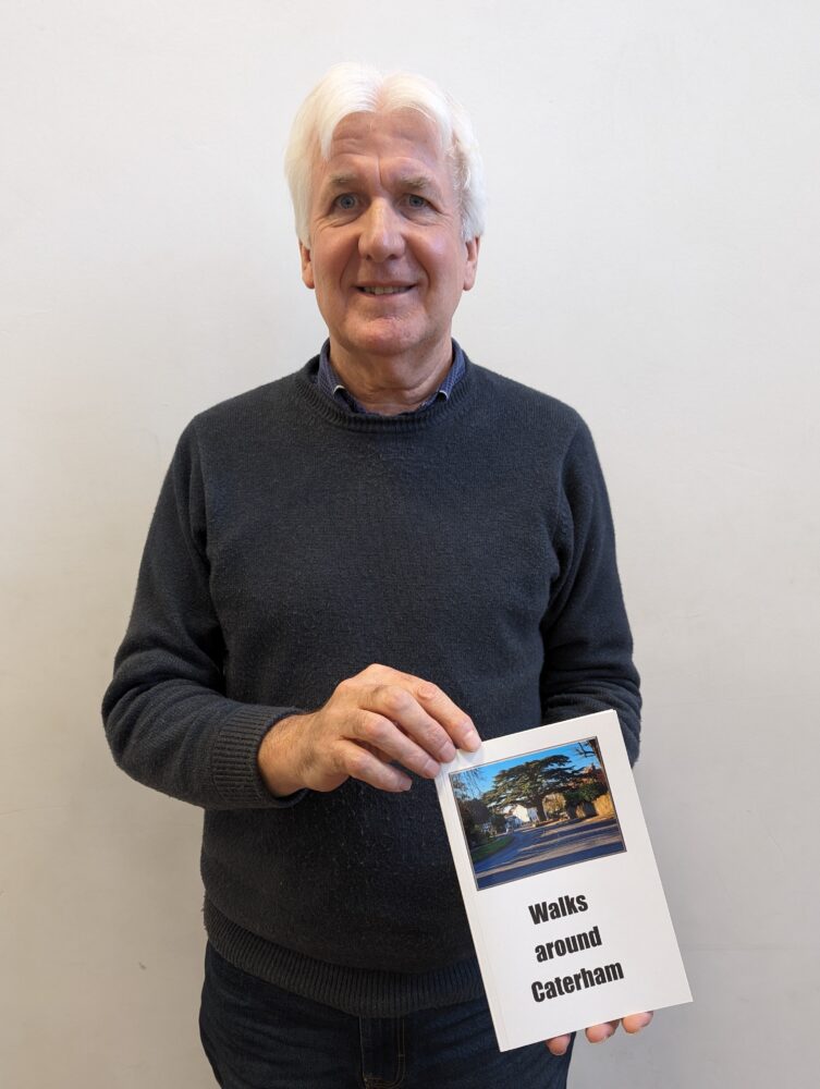David Bryan with his book Walks around Caterham